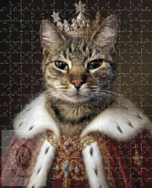Cat in regal attire with crown on a puzzle